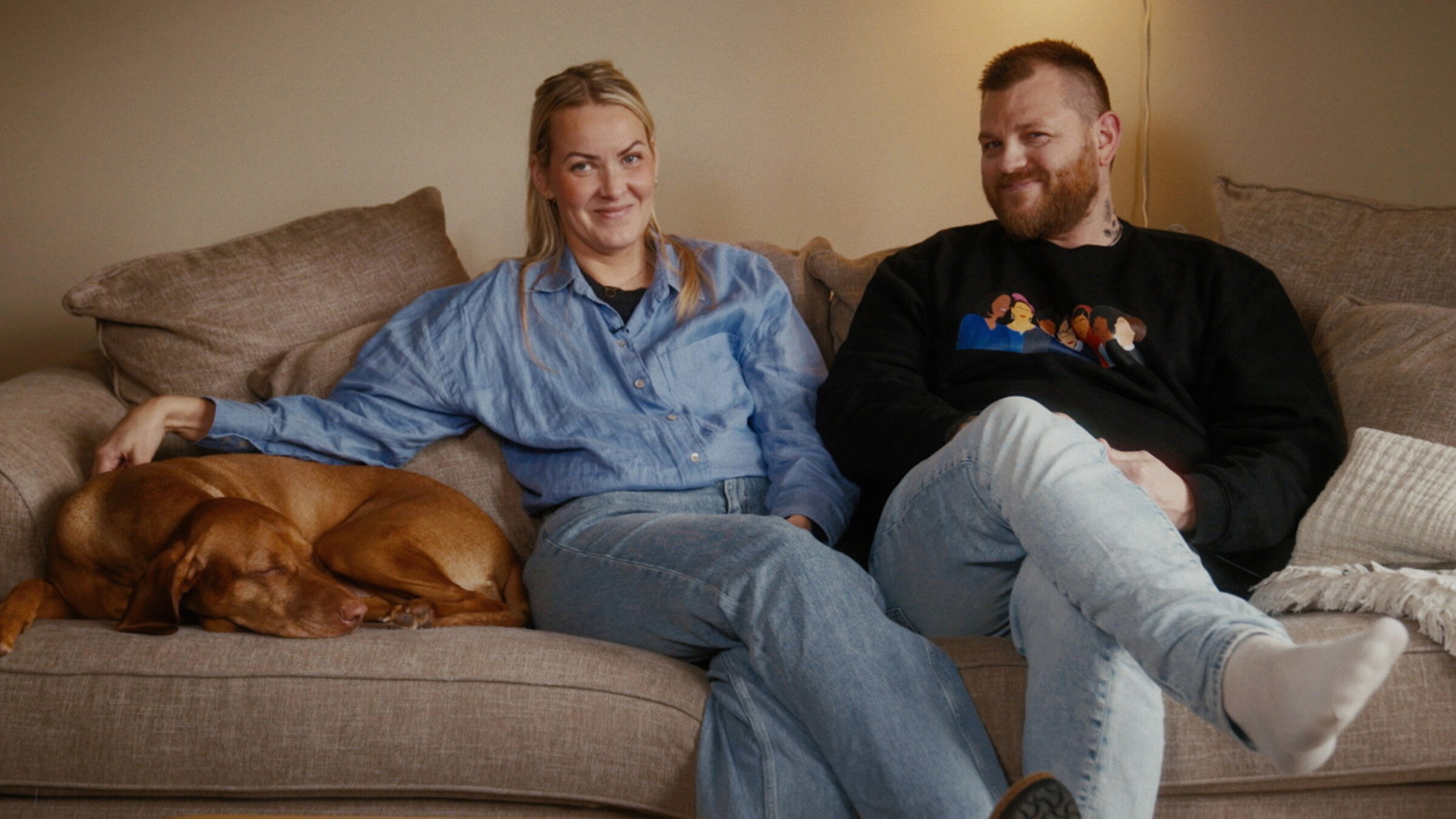 "Island und die Gleichstellung": Frau und Mann mit Hund.