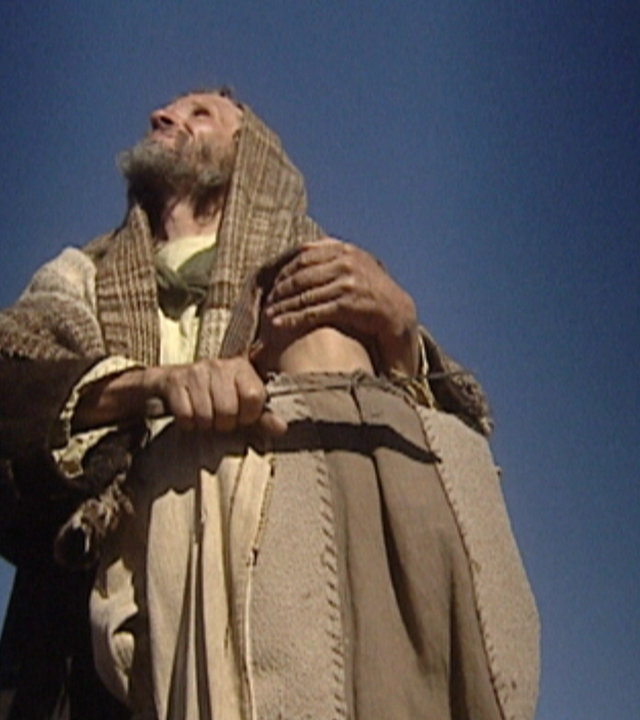 "Die glorreichen 10 - Die fiesesten Verwandten der Geschichte": Abraham hält seinen Sohn Isaak im Arm  und drückt ihm ein Messer an die Kehle.